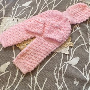 Beautiful pink knitted crocheted baby set